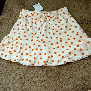White skirt with polka dots